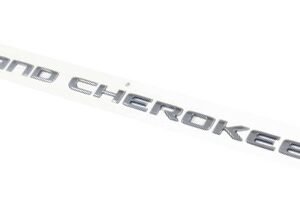 Chrome Grand Cherokee and Flag Front Door Badge for the 2021-2026 Grand Cherokee L and 2022-2026 Grand Cherokee WL